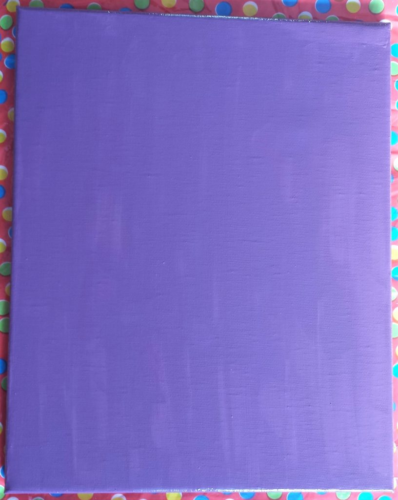 Canvas after second coat of purple paint.