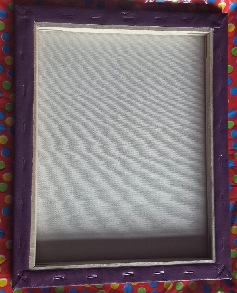 Back of the Canvas after being painted purple.