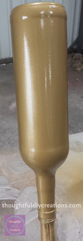 Third Layer of Gold Spray Paint added to the Wine Bottle.