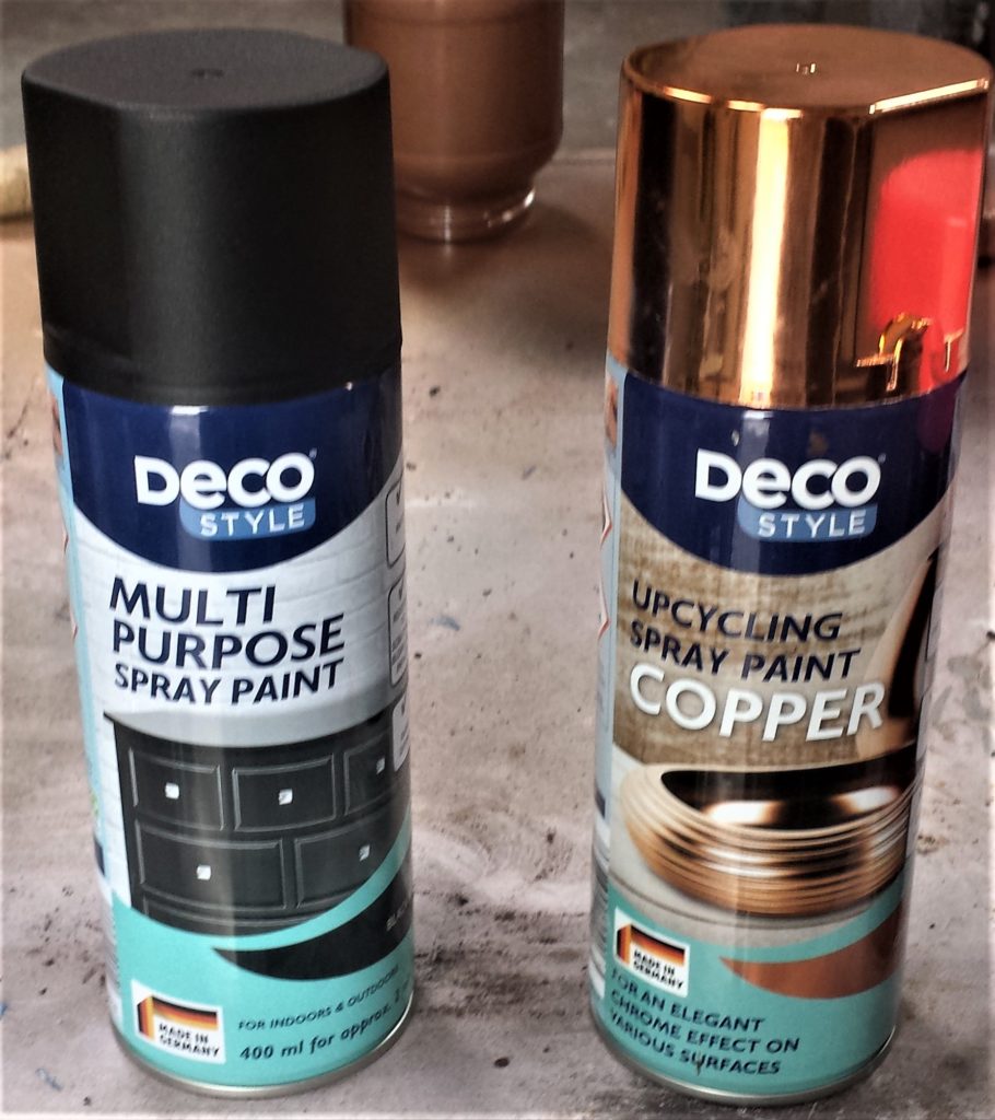 Black and Copper Spray Paint Cans.