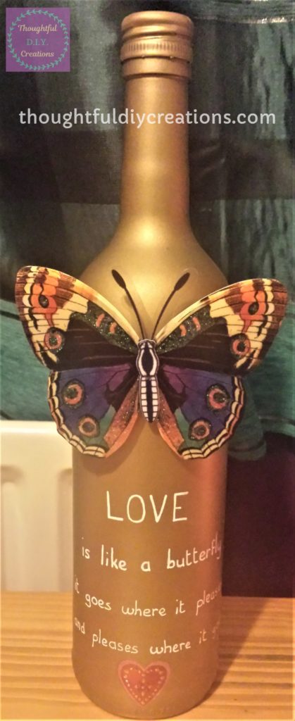 Gold and Peach Love Heart Sticker attached to the bottom of the Wine Bottle.