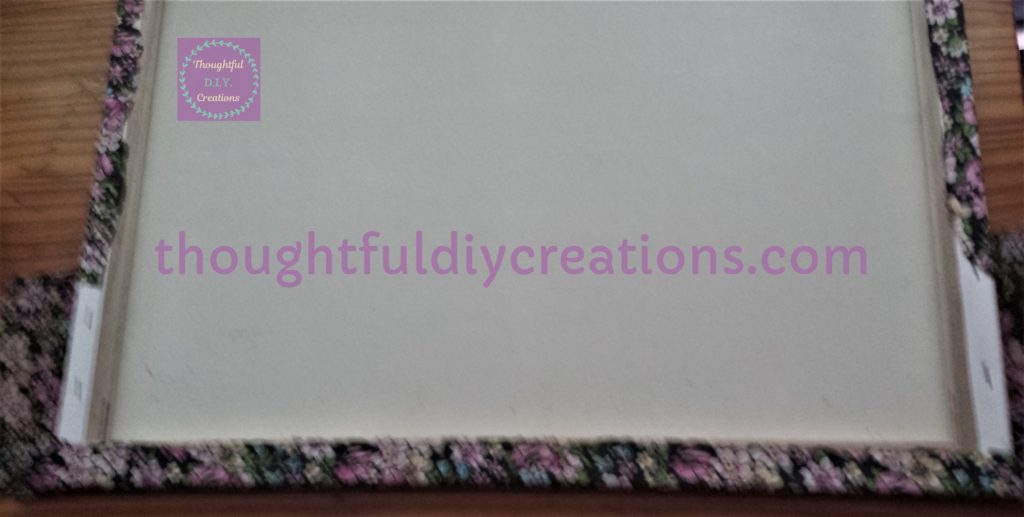 Attaching the Floral Fabric to the top half of the 2 sides and back of the canvas.