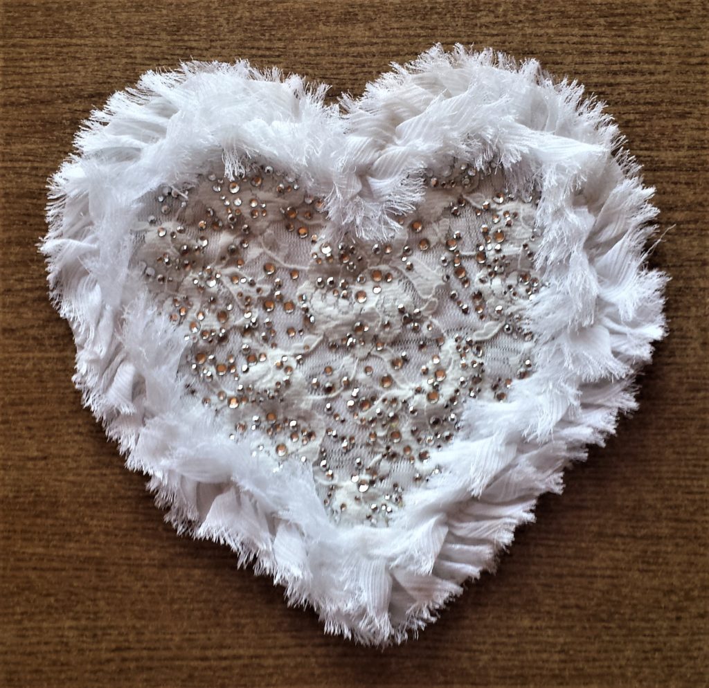 Fabric Heart shape from an old t-shirt to spell out the 'O' in JOY.