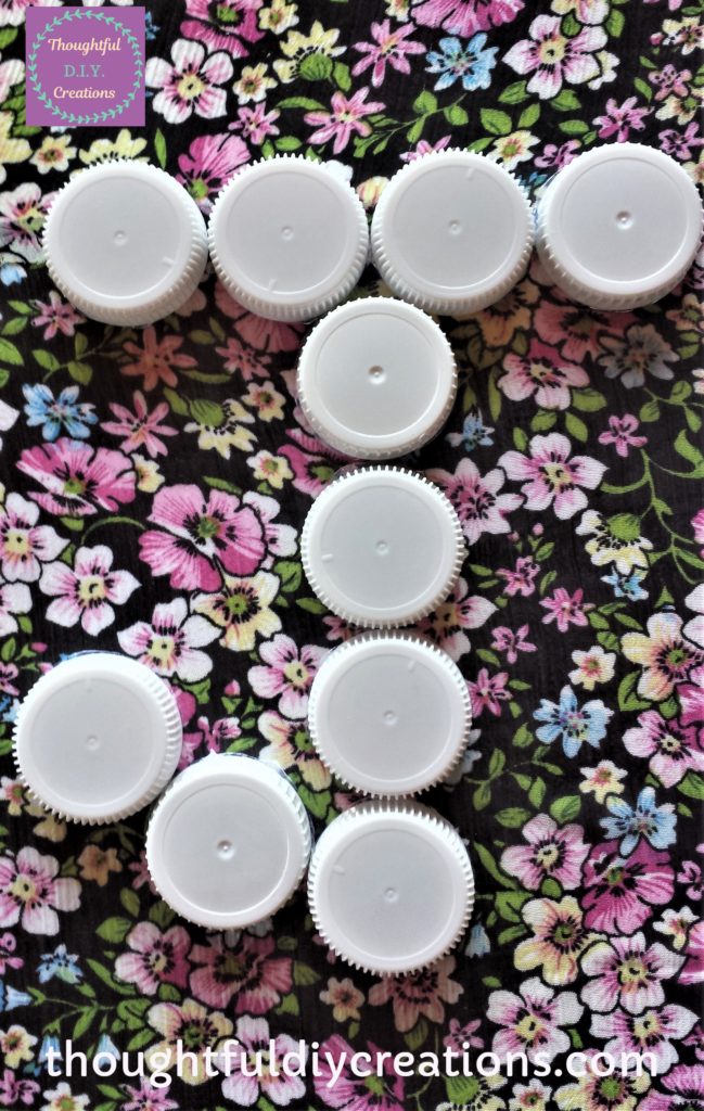 The letter 'J' after being glued to the canvas.