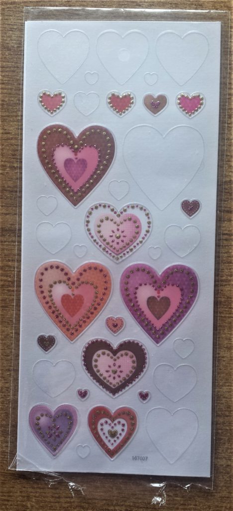 Packet of love heart stickers.