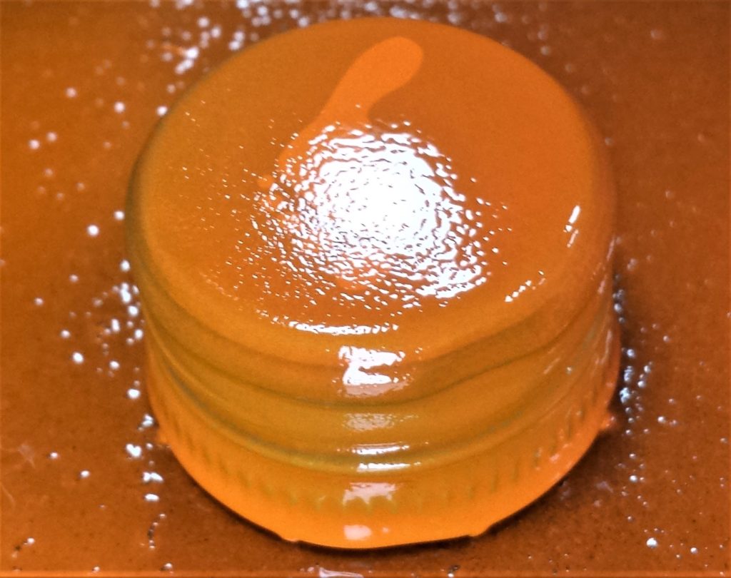 Second layer of spray paint on the lid.