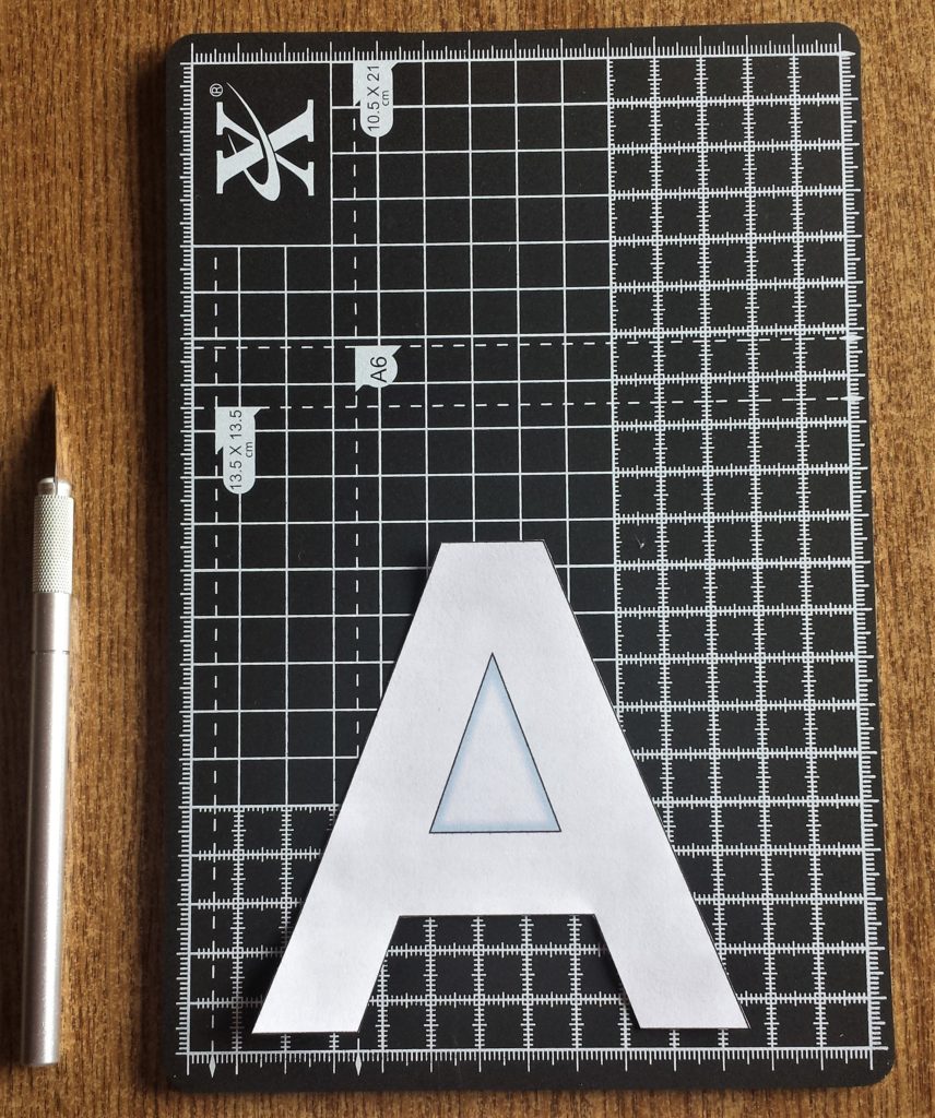 The letter 'A' before being cut with the craft knife.
