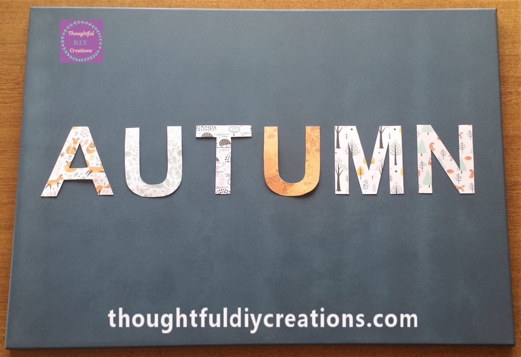 The letters spelling Autumn on the Canvas.