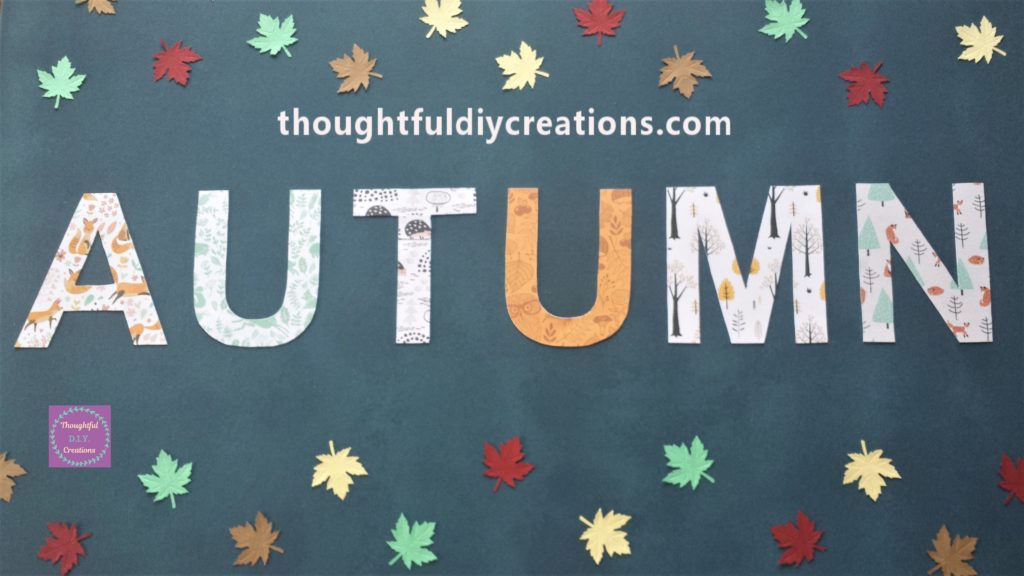 Close up image of the leaves glued to the canvas.