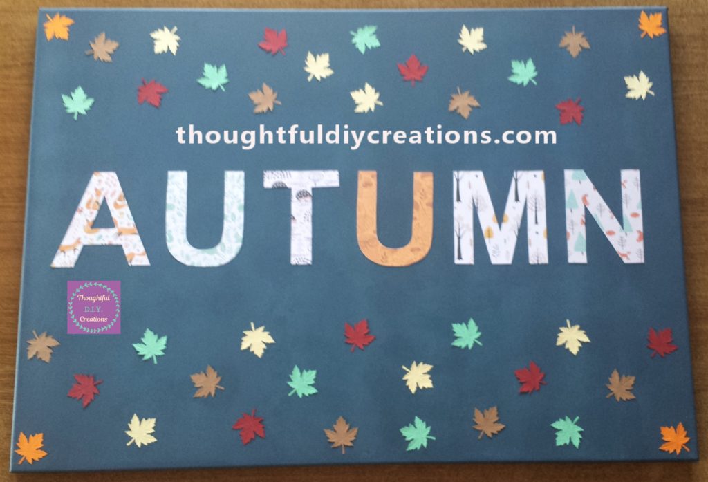 Full view of the canvas with all the leaves glued down.