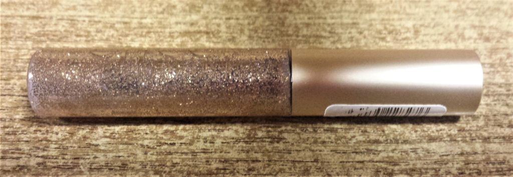 Gold glitter eye liner.