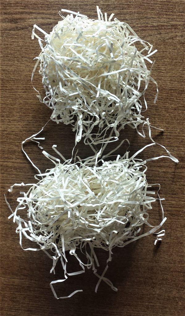 Shredded straw effect paper.