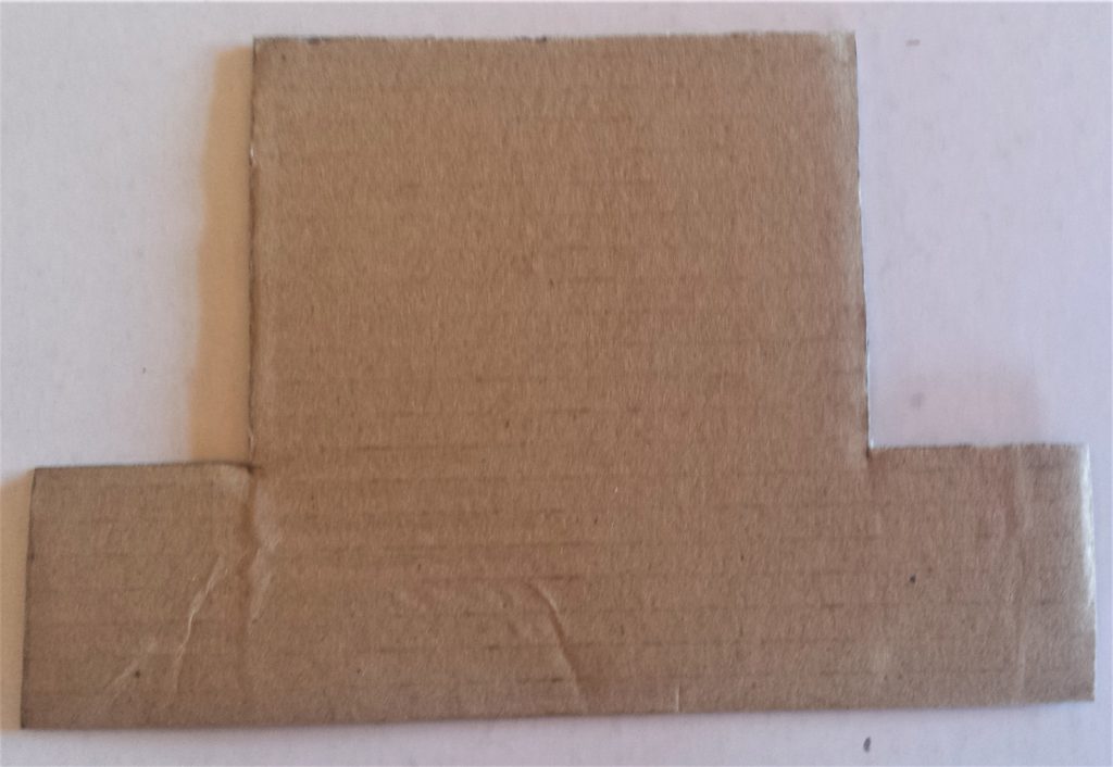 Hat cut out of cardboard.