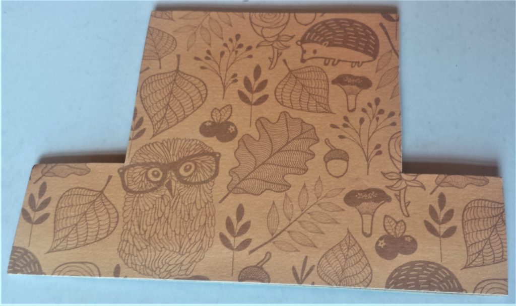 Paper hat glued to the cardboard hat.