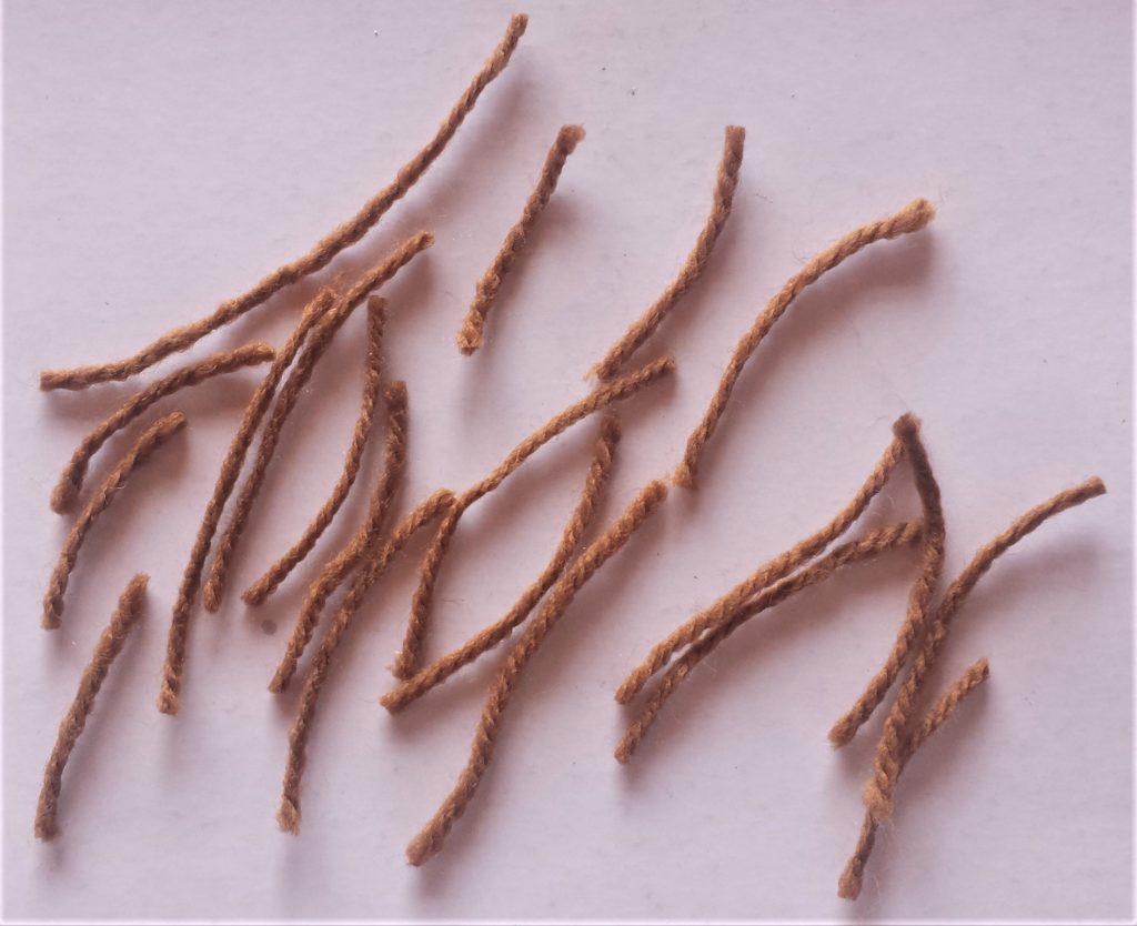 20 random lengths of wool.