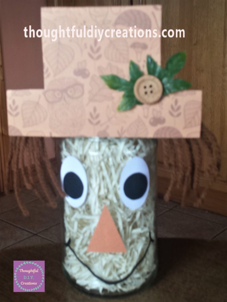 Smile drawn on the jar three times.