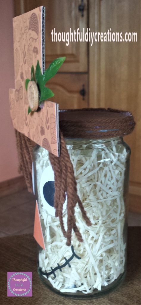 Completed scarecrow jar from the side angle.