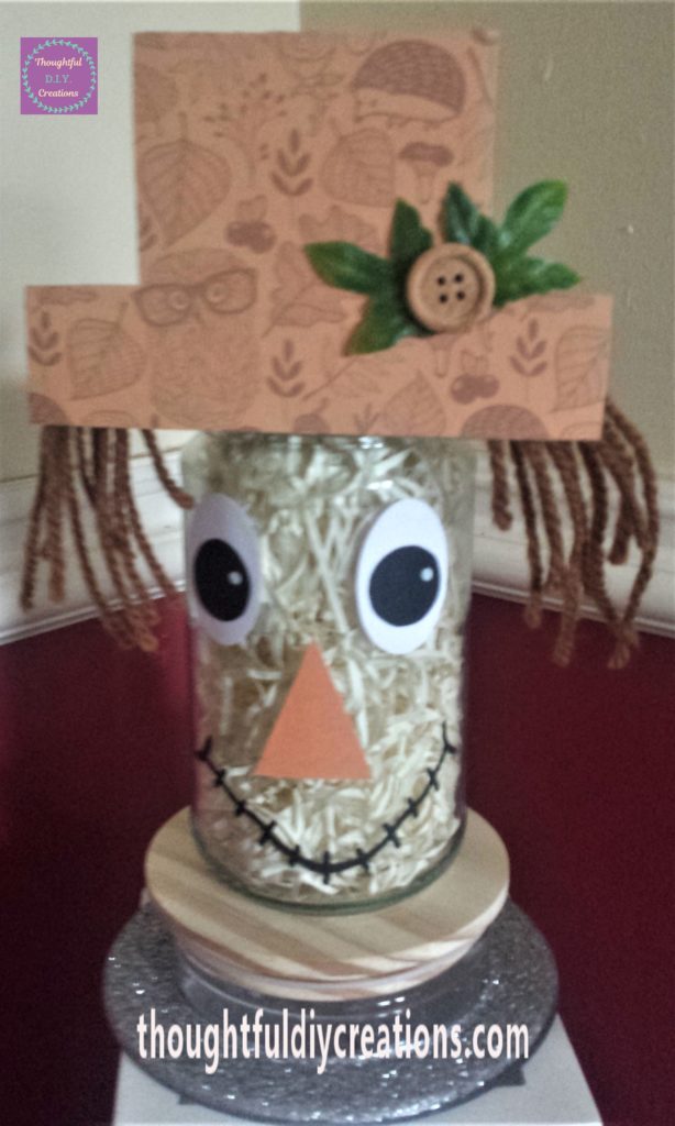 Completed scarecrow jar from the front.