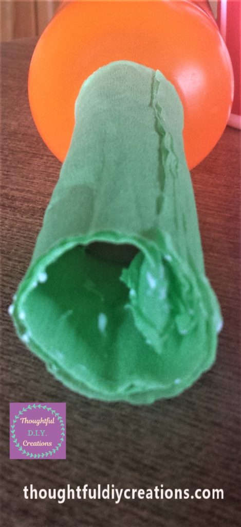 Glue added to the top of the crepe paper.