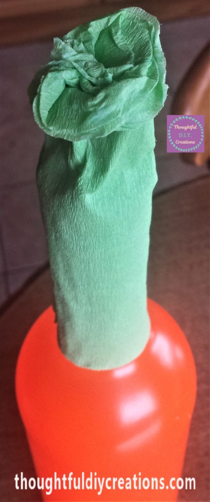 The crepe paper ruffled together to resemble a stalk.