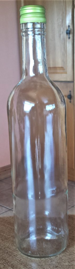 Wine Bottle washed and dried with the label peeled off.