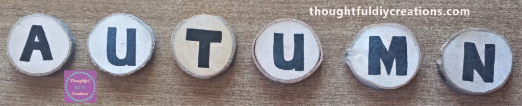 The AUTUMN letters filled in with the black paint pen.