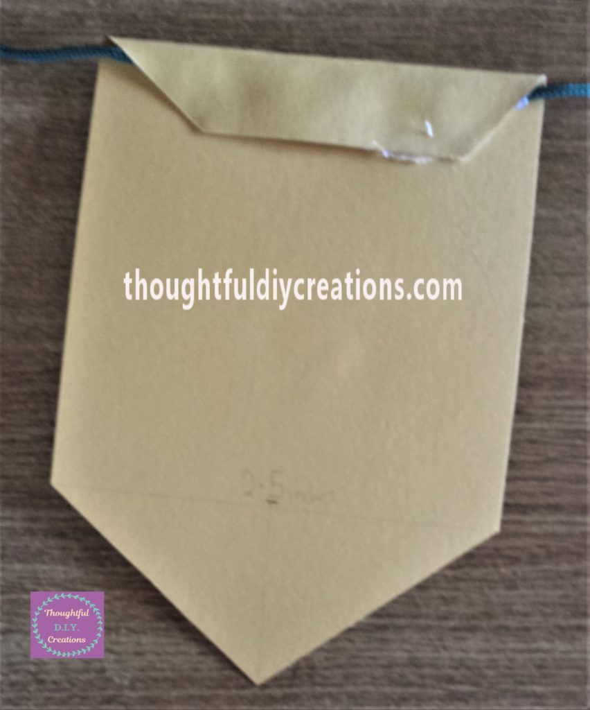 The string hot glued to the back of the bunting.