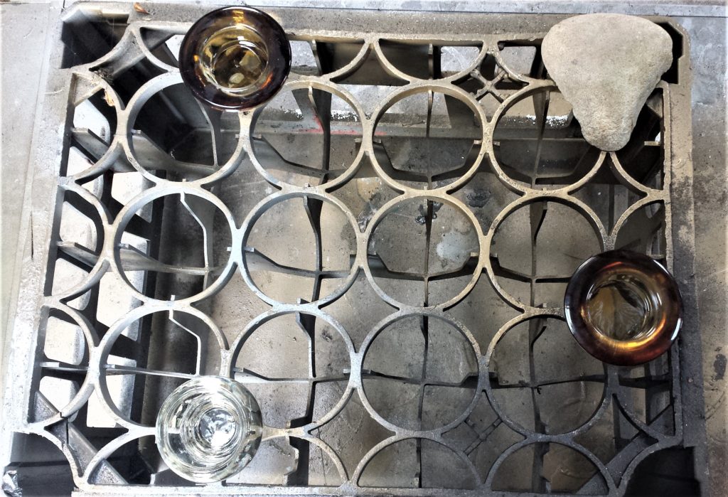 The Candle Holders on an old Crate on a table.