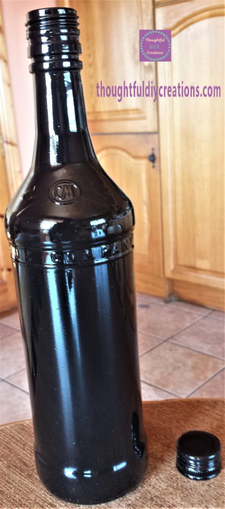 Back of the bottle after being spray painted.