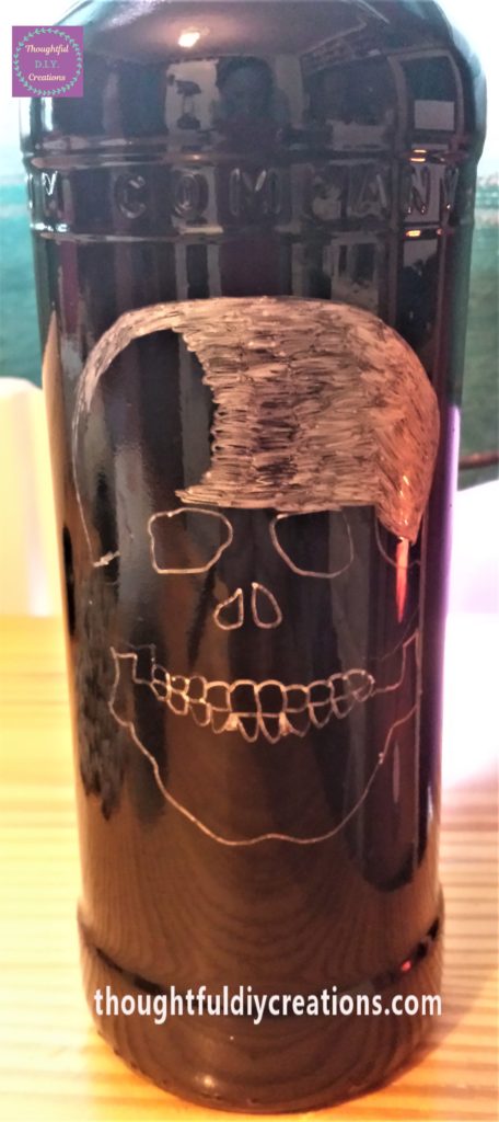 Beginning to shade the inside of the skull using the paint pen.