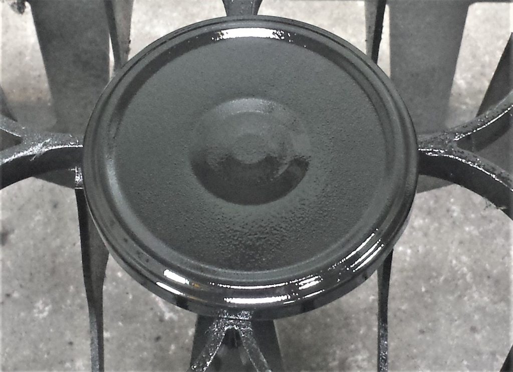 Second coat of spray paint on the lid.