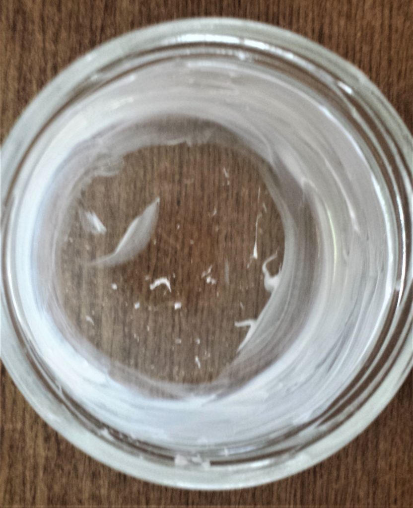 Glue spread around the inside of the jar.