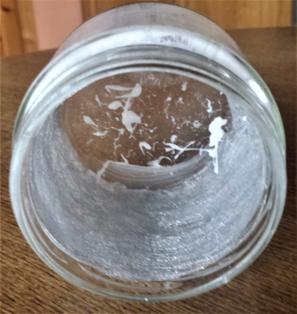 Silver fabric paper inside the jar.