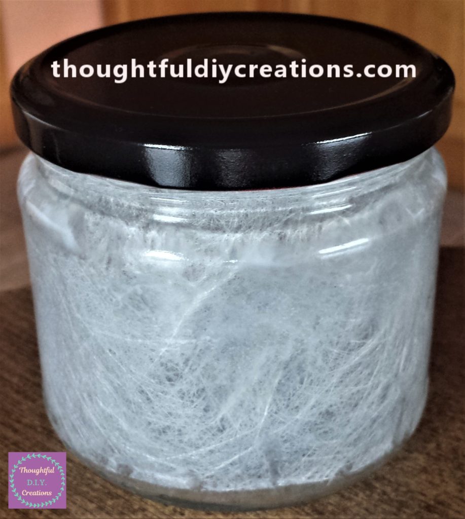 Jar with fabric paper glued to the inside, fully dry.