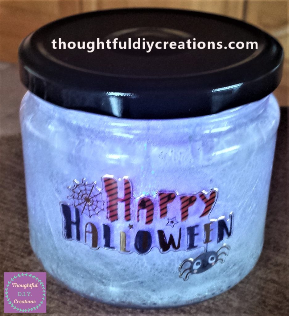 Happy Halloween Sticker on the mid-section of the jar.