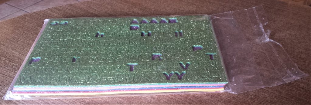 Pack of Coloured Glitter Alphabet Stickers.