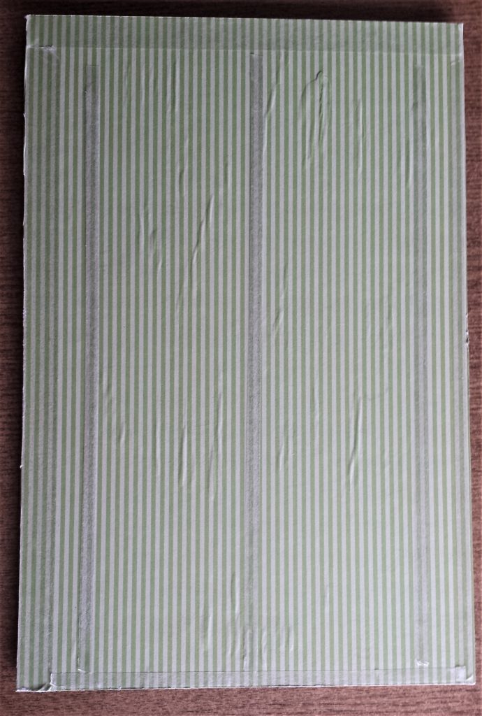 The backing of the Double-Sided Tape peeled off.