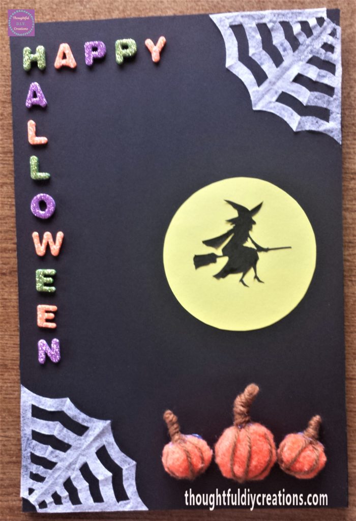 Glitter Alphabet Letters attached to the Halloween sign.