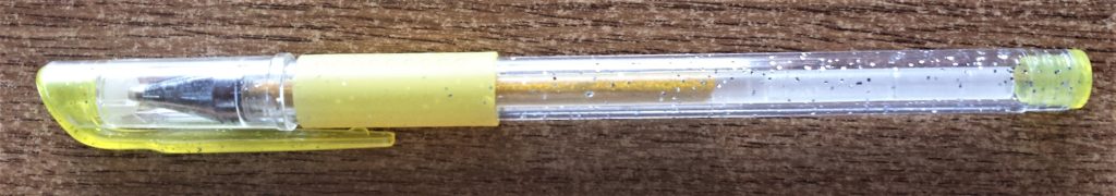Yellow glitter gel pen.