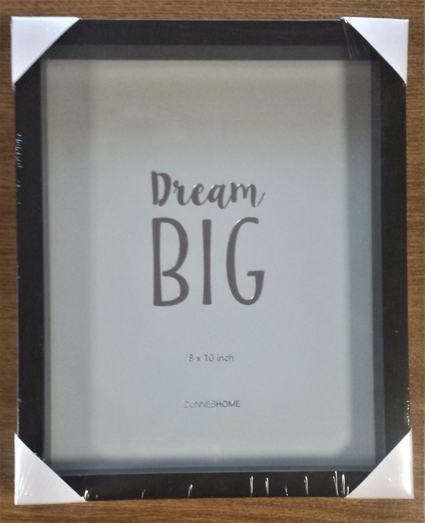 Black shadow box frame.