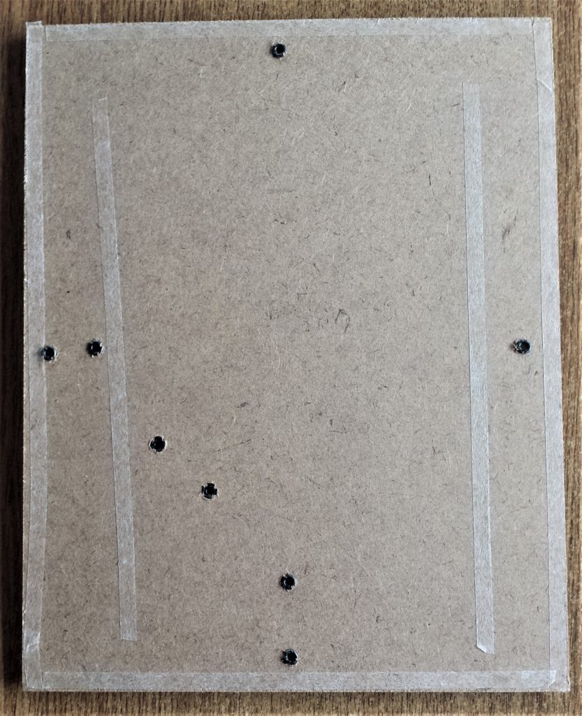 The backing removed from the double sided tape.