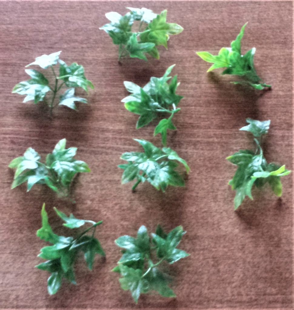 Sections of leaves cut out.