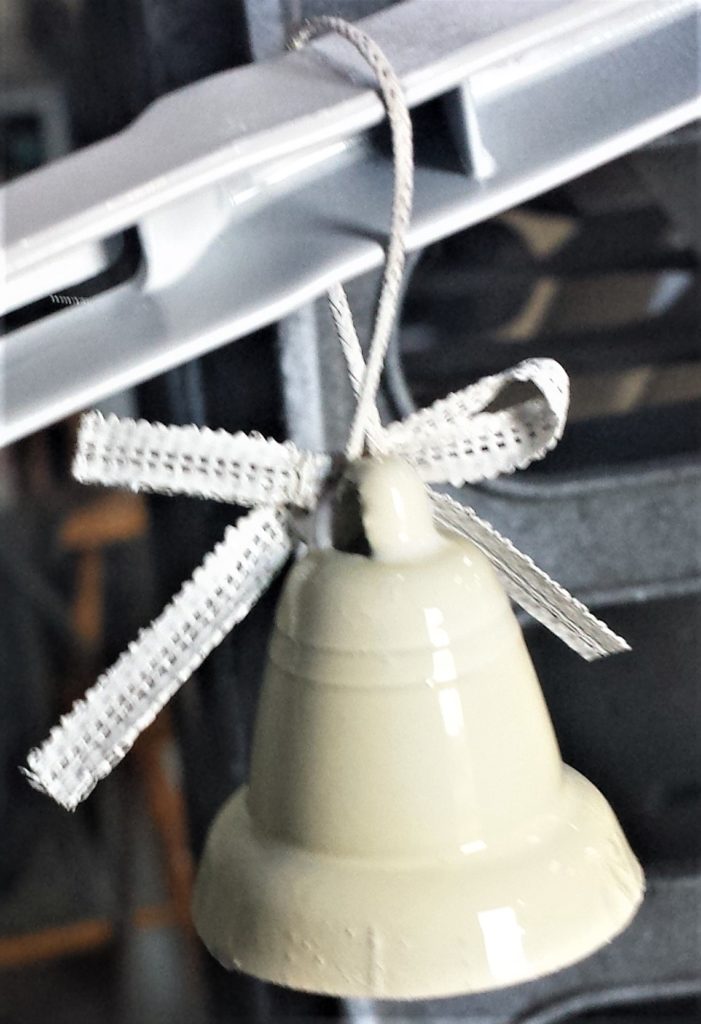 Second layer of spray paint on the bell.