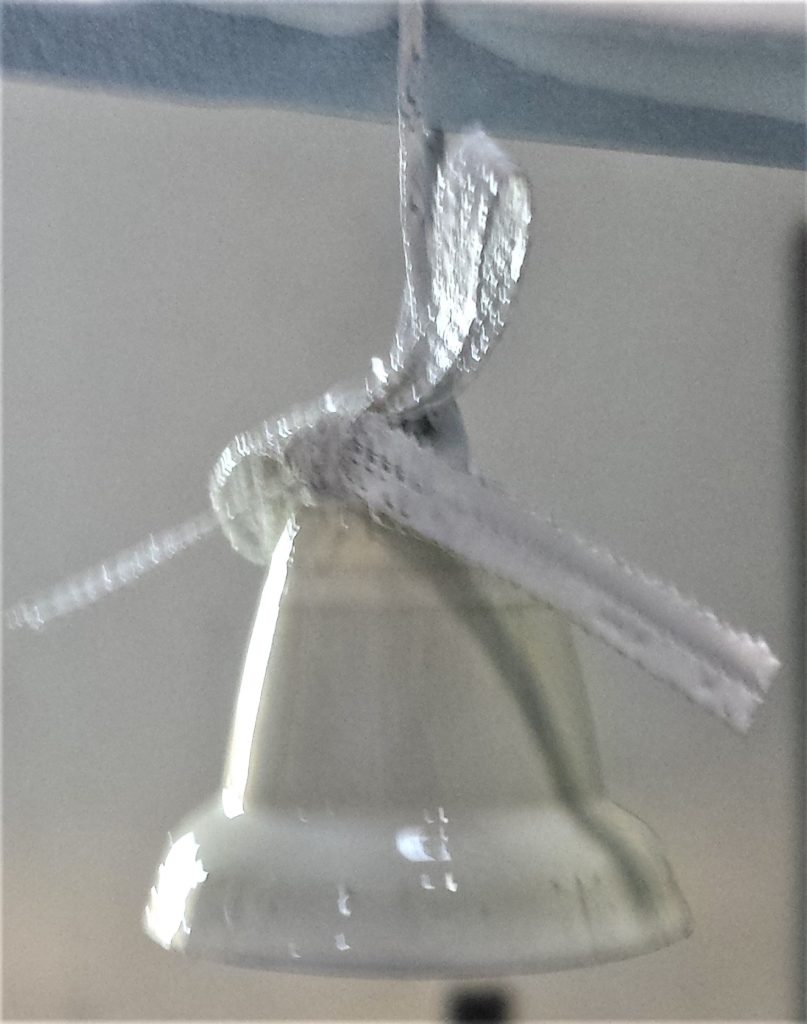 Third layer of spray paint on the bell.