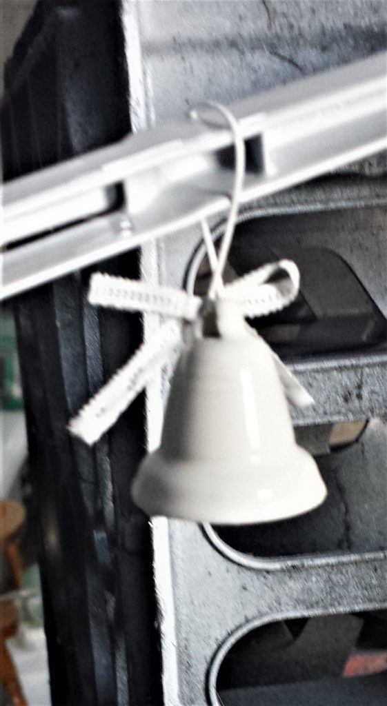 Fourth layer of spray paint on the bell.