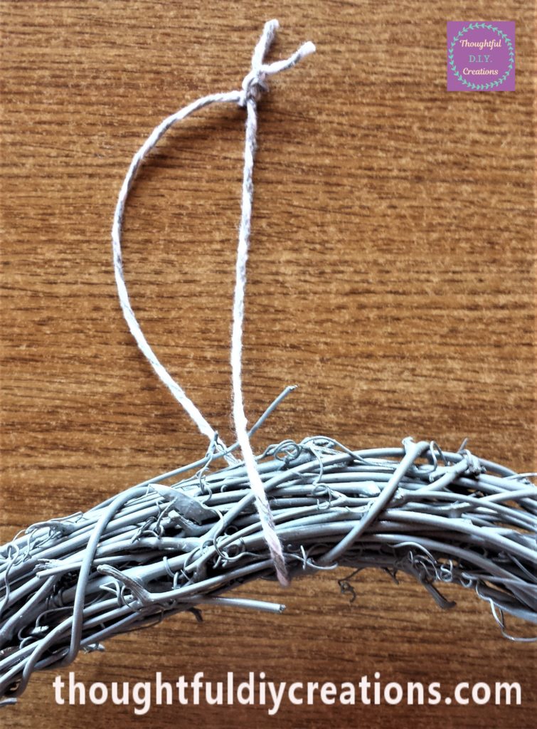 The excess string at the top cut off.