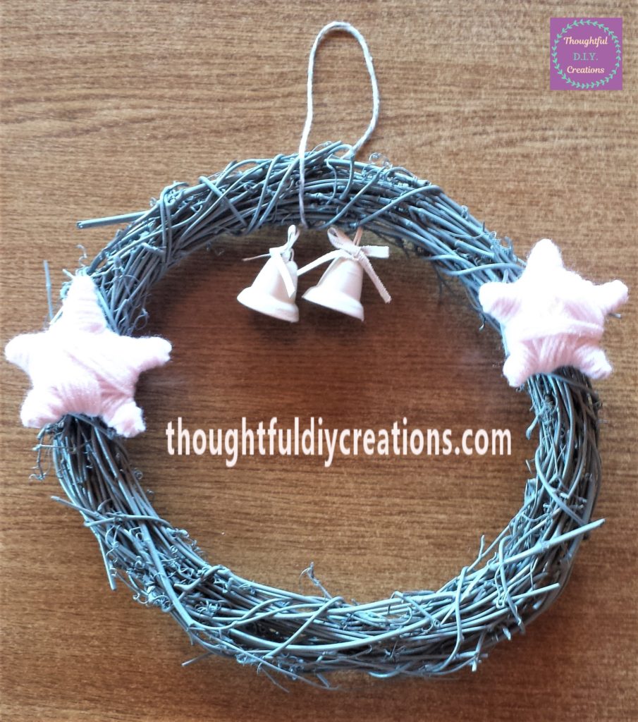 The stars added to each side of the wreath.