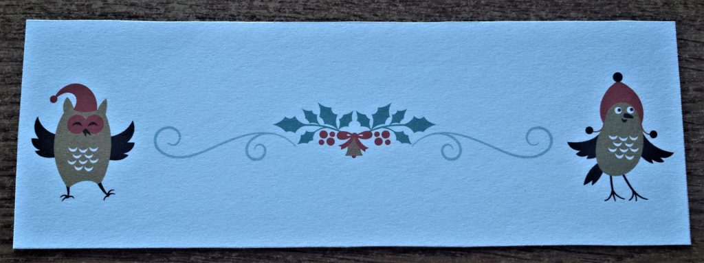 The mid-section of the Christmas page cut out.