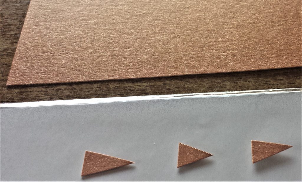 3 triangle shapes for each snowman nose cut out.