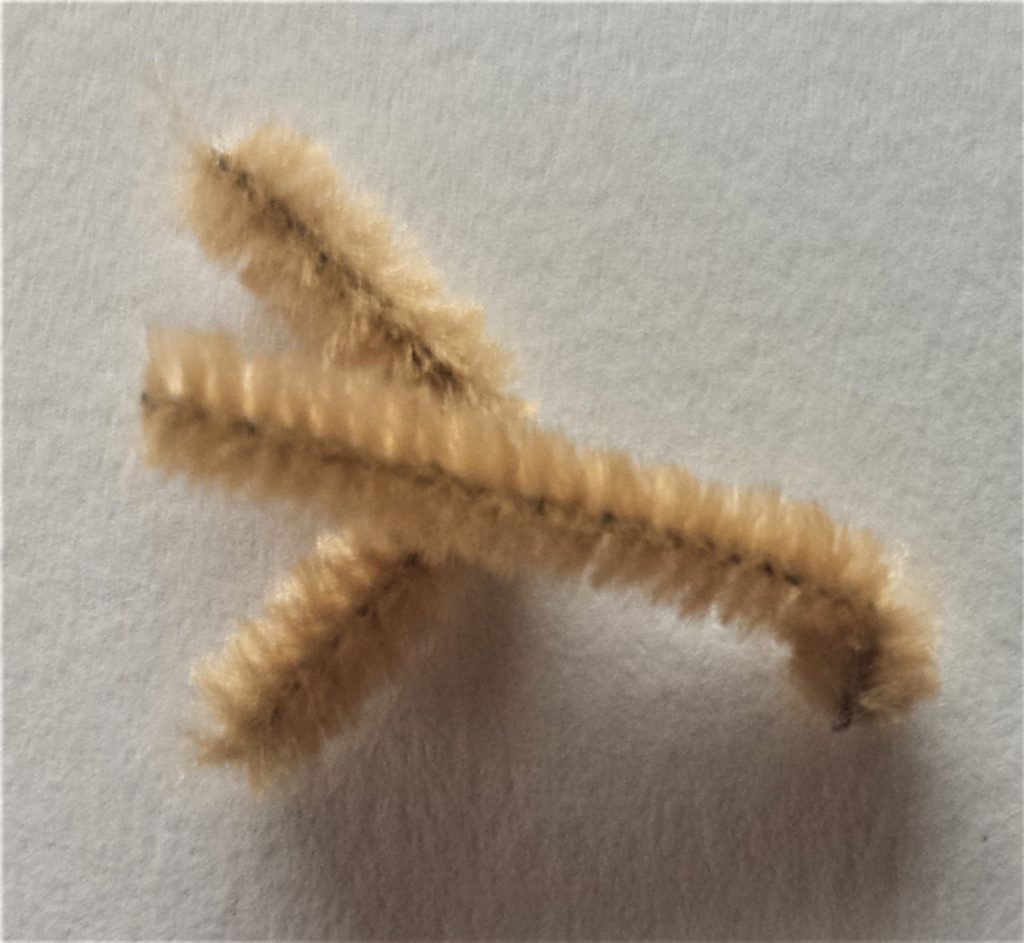 The first snowman arm is complete.